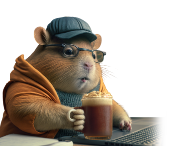 A rotund gerbil using a laptop.